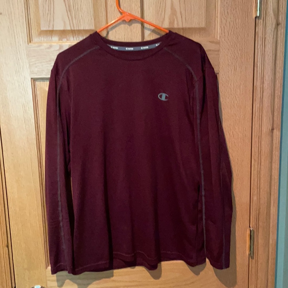 Long Sleeve athletic shirt. Maroon color made by champion.